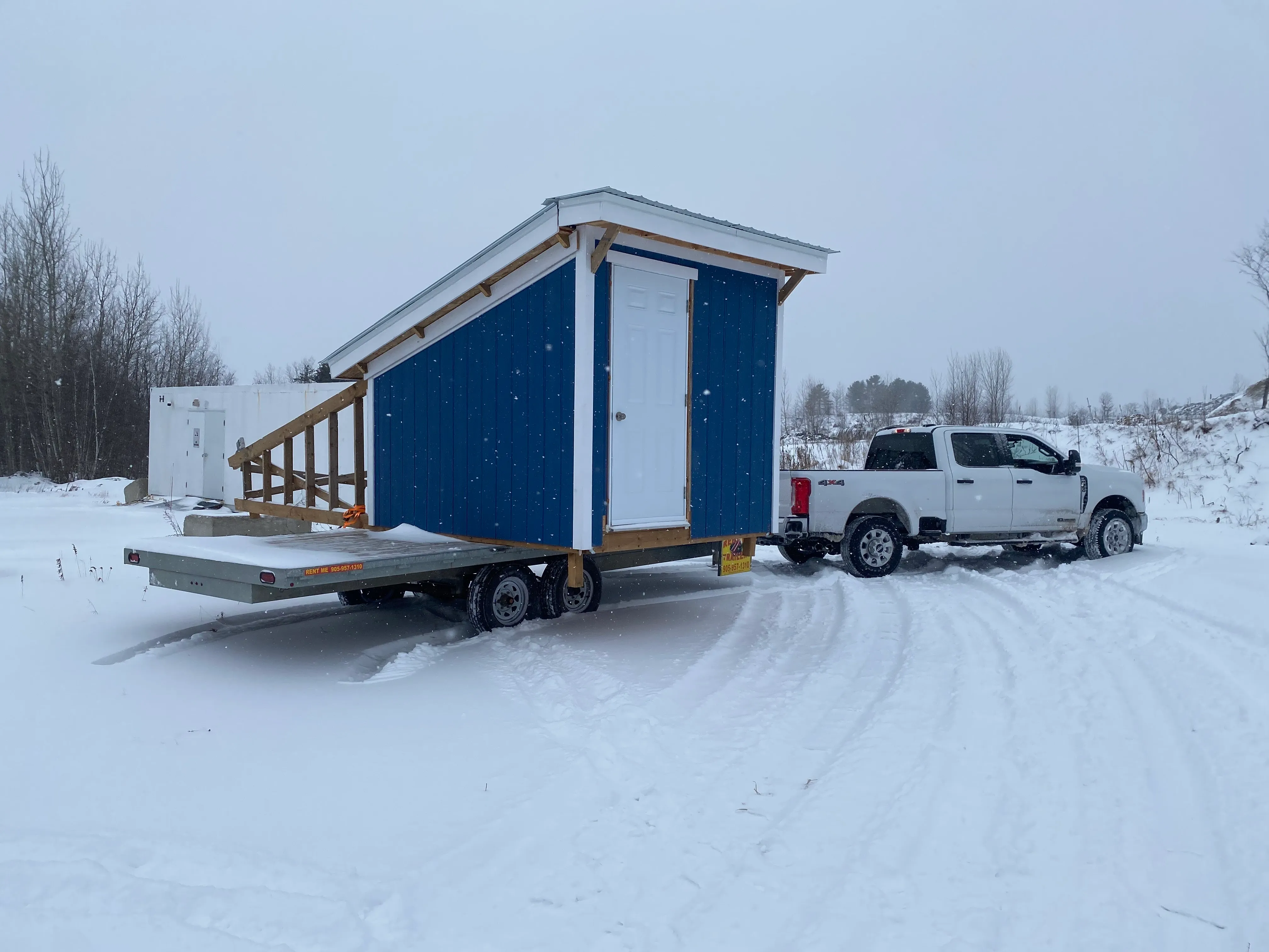 1:00pm: The trailer was now moved to an open position and we could start rotating it. This involved reinstalling the beams and lifting up a few inches so that we could remove the trailer and back it in with the correct orientation.
