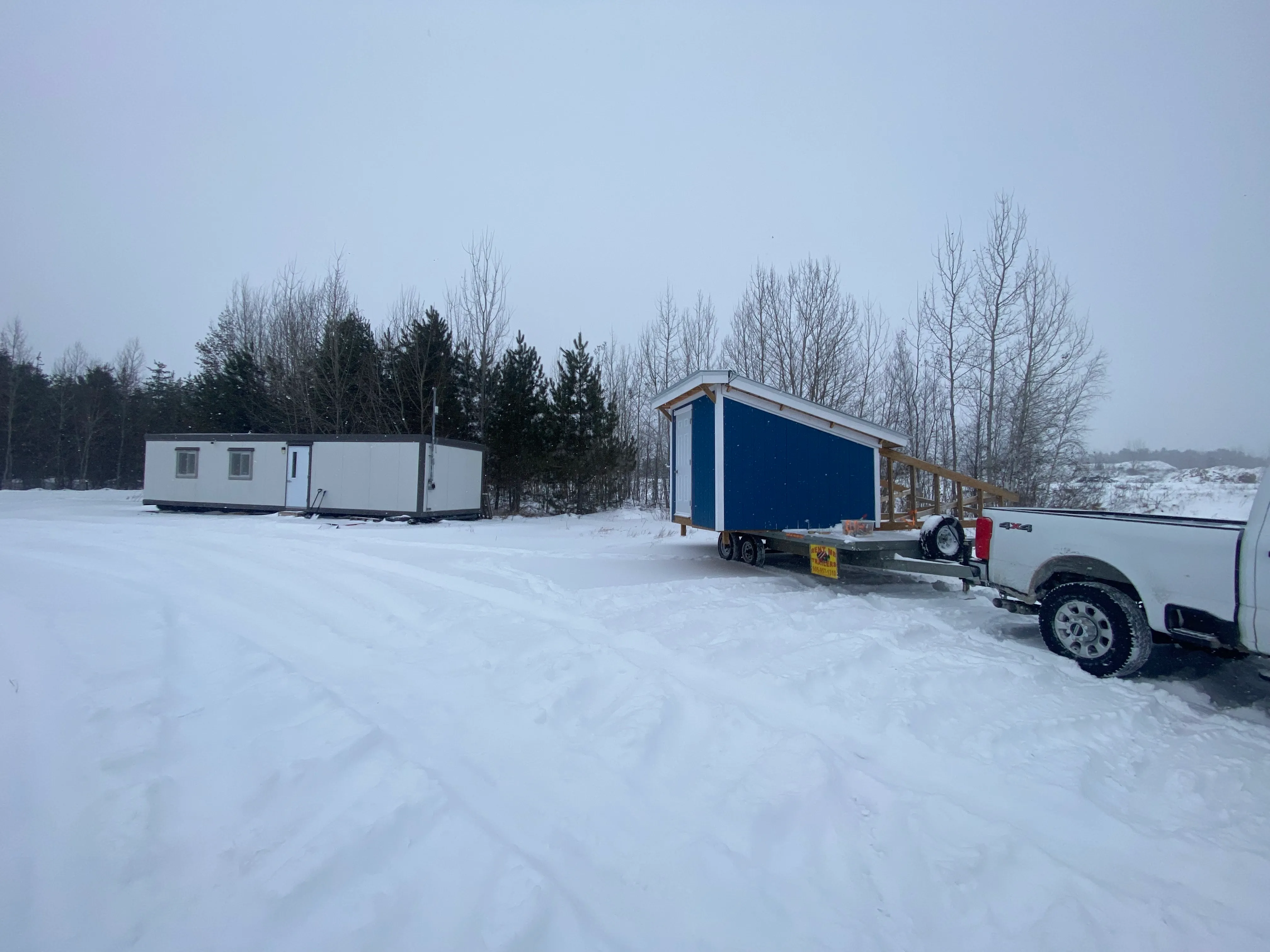 1:00pm: The trailer was now moved to an open position and we could start rotating it. This involved reinstalling the beams and lifting up a few inches so that we could remove the trailer and back it in with the correct orientation.