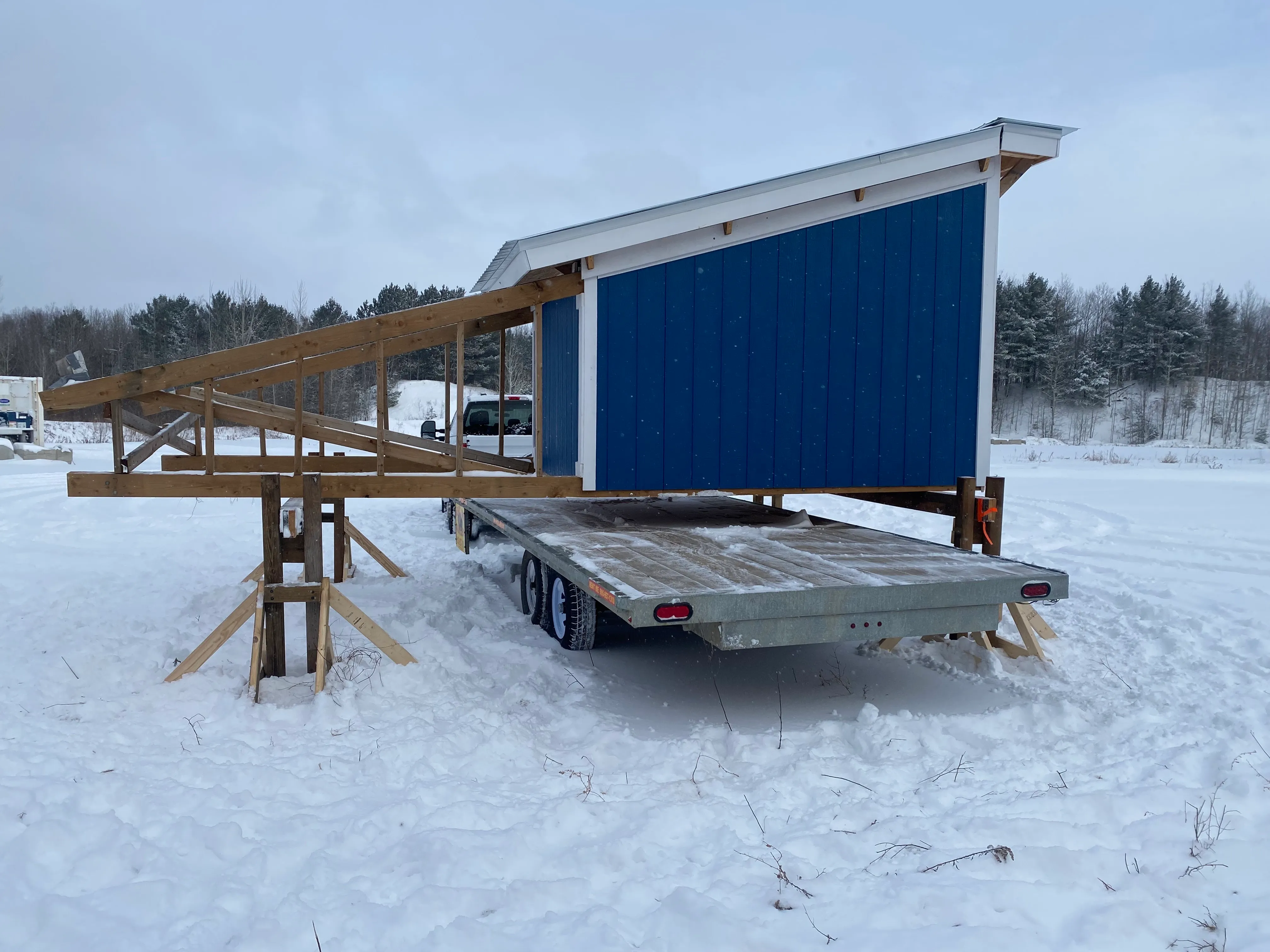 4:00pm: With the trailer oriented properly, we just had to strap everything down, clean up and get on the road. We installed eyebolts in the frame of the observatory to attach ratchet straps on, allowing us to secure the structure down.
