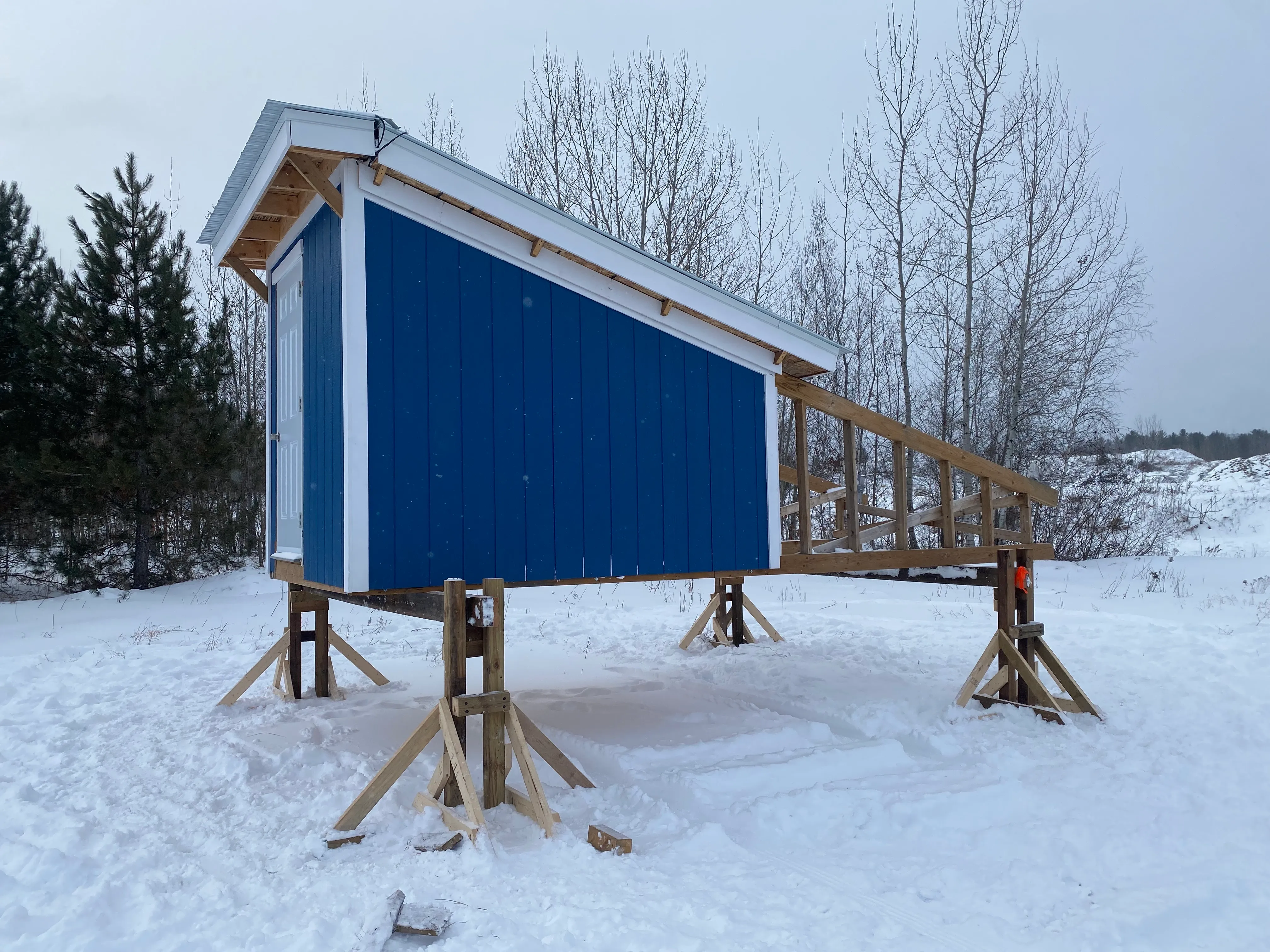 4:00pm: With the trailer oriented properly, we just had to strap everything down, clean up and get on the road. We installed eyebolts in the frame of the observatory to attach ratchet straps on, allowing us to secure the structure down.